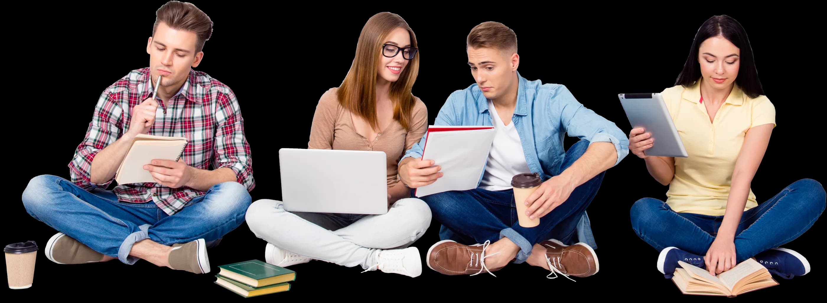 Students studying with laptops, notebooks and a tablet
